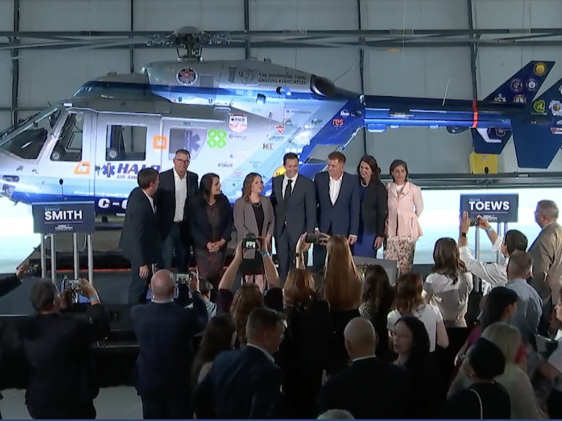 A photo of the UCP leadership candidates gathered ’round a helicopter in Medicine Hat last night – the print on the image indicates the transmission problems that plagued the party’s livestream throughout the debate.