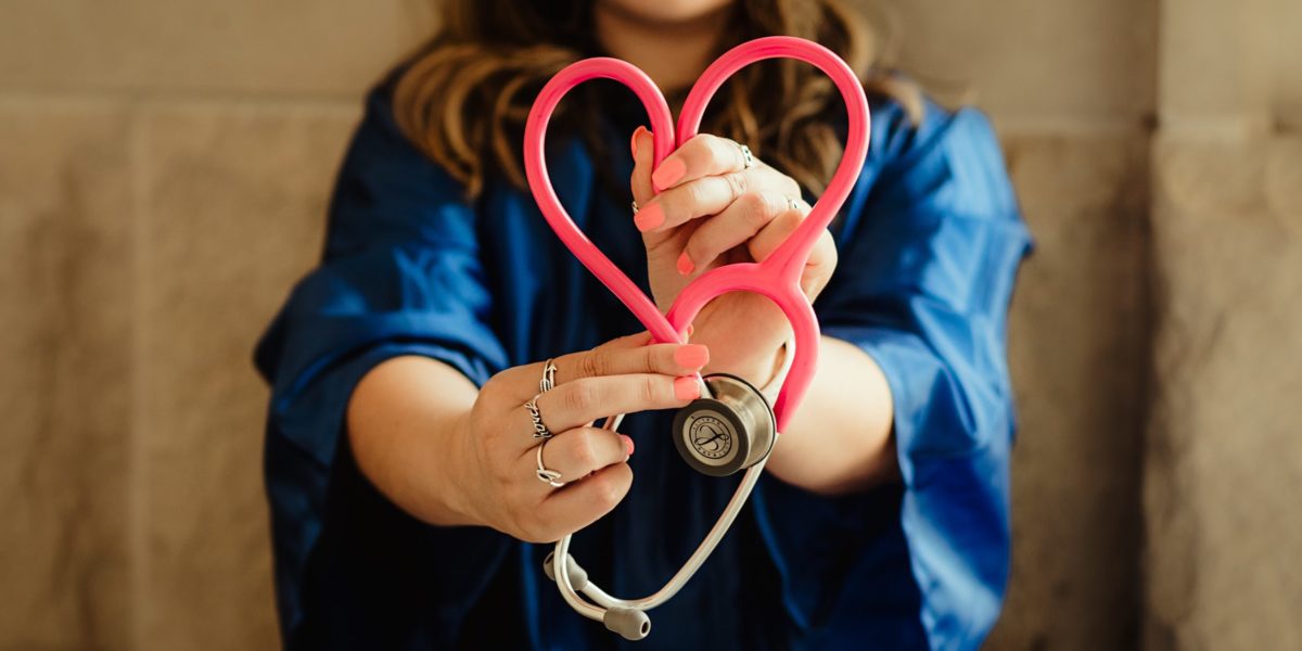 A photo of a nurse with a stethoscope.