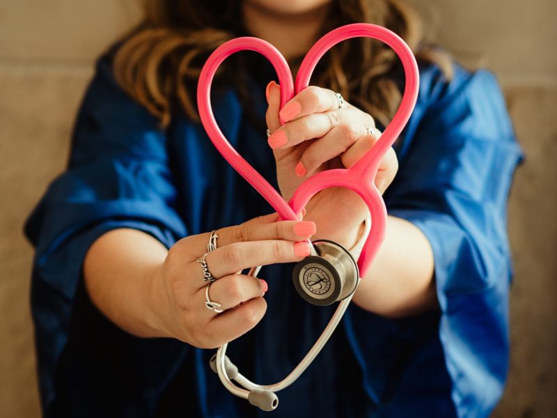 A photo of a nurse with a stethoscope.