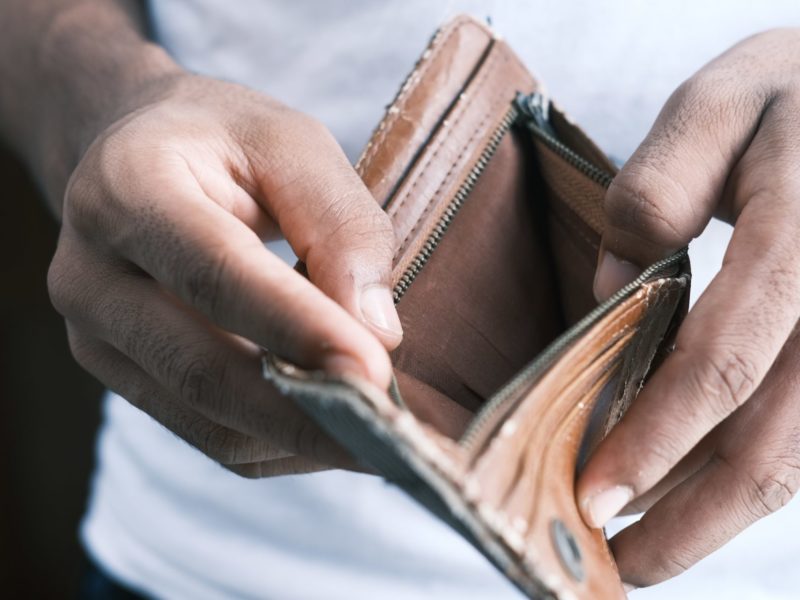 A photo of an empty wallet. The goal of a Basic Income is to help keep wallets full.