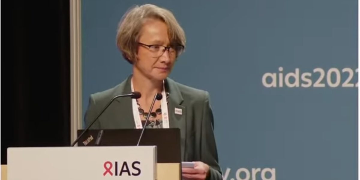 A photo of IAS Executive Director Brigit Poniatowski speaking at the 2022 IAS conference in Montreal.