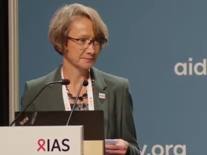 A photo of IAS Executive Director Brigit Poniatowski speaking at the 2022 IAS conference in Montreal.