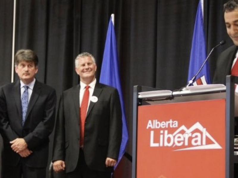 A photo of Raj Sherman accepting the Alberta Liberal Party leadership in 2011