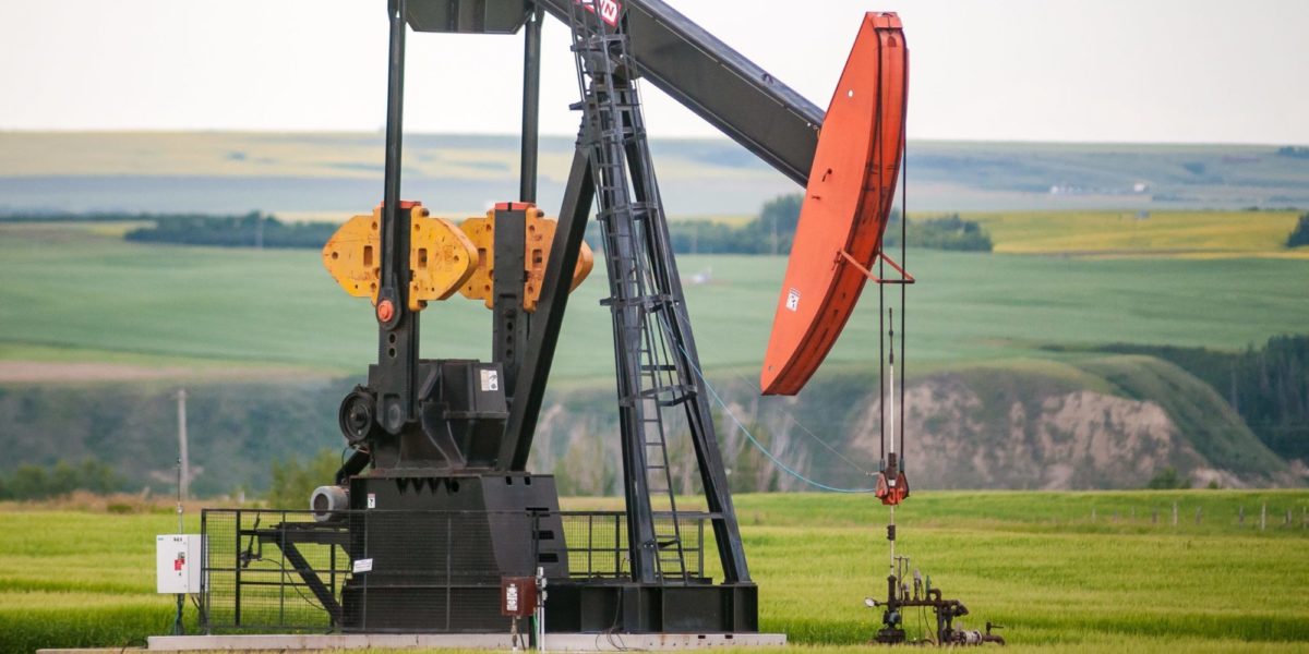 A photo of an oil pump jack in Alberta's Red River Valley.