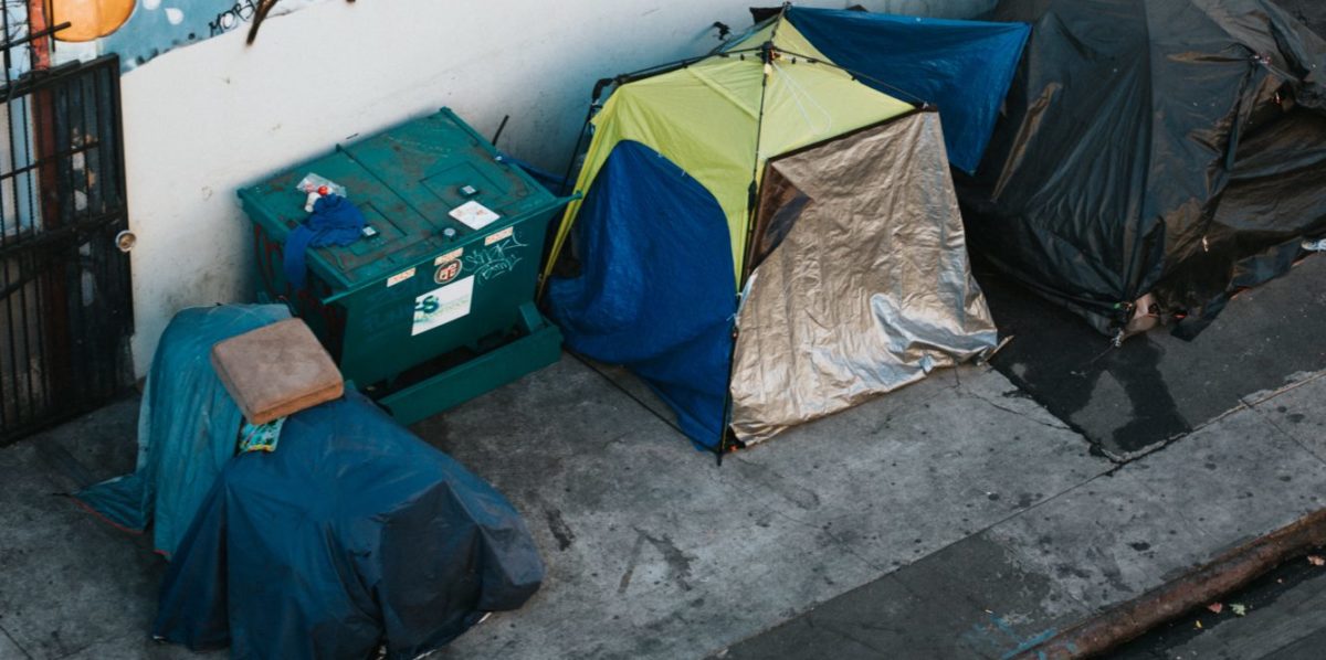 A photo of homeless encampments in a North American city.