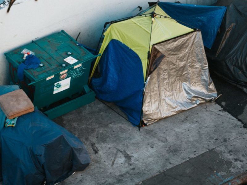 A photo of homeless encampments in a North American city.