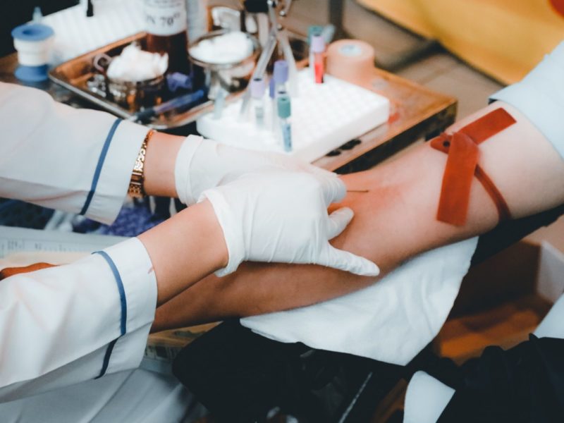 A photo of a person donating blood or plasma.