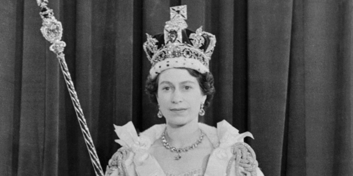 A photo of Queen Elizabeth II shortly after her coronation wearing the Imperial State Crown.