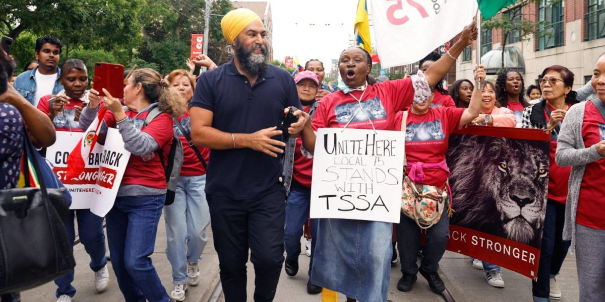 A photo of Jagmeet Singh marching in support of unionized workers earlier this year.