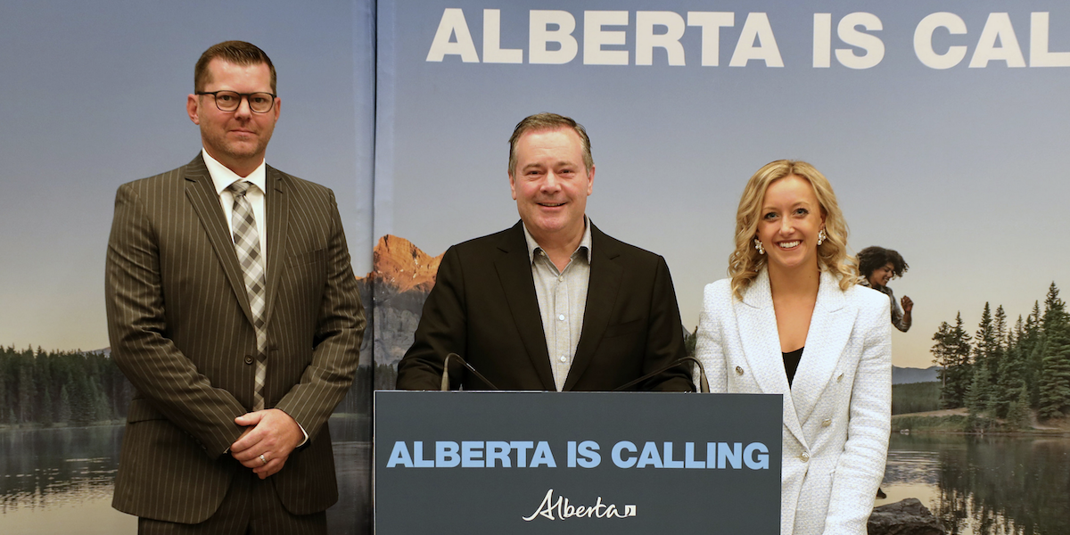 A photo of Alberta Premier Jason Kenney, flanked by UCP rural MLAs R.J. Sigurdson and Miranda Rosin as they hung around the Toronto Transit Commission’s Yonge and Bloor subway station yesterday touting the bright lights of Wild Rose Country.