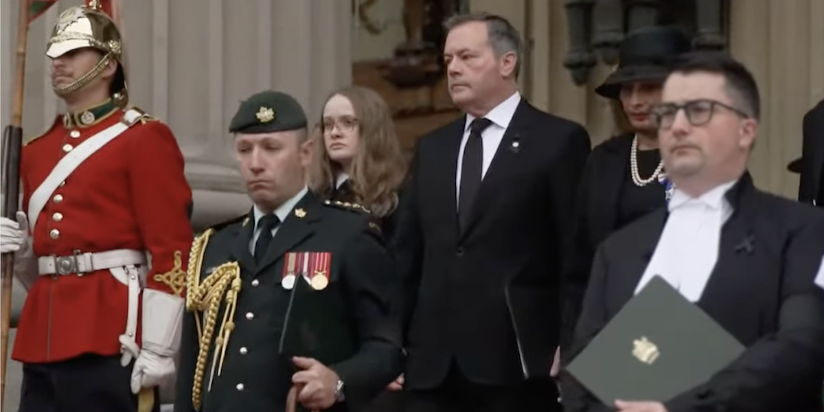 A screenshot of Alberta Premier Jason Kenney, looking tired, arrives at yesterday’s ceremony in memory of Queen Elizabeth II on the steps of the Alberta Legislature.