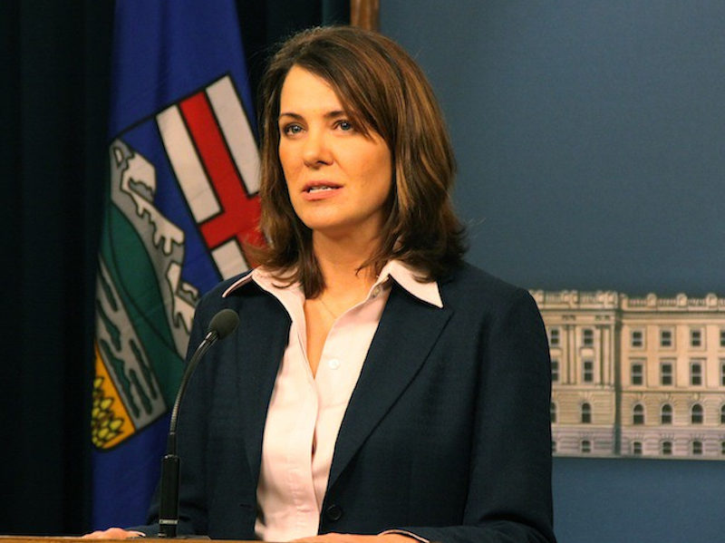 A photo of Danielle Smith in 2014, around the time she led many of her Wildrose Party MLAs across the floor to join the Progressive Conservative Party; disaster followed.