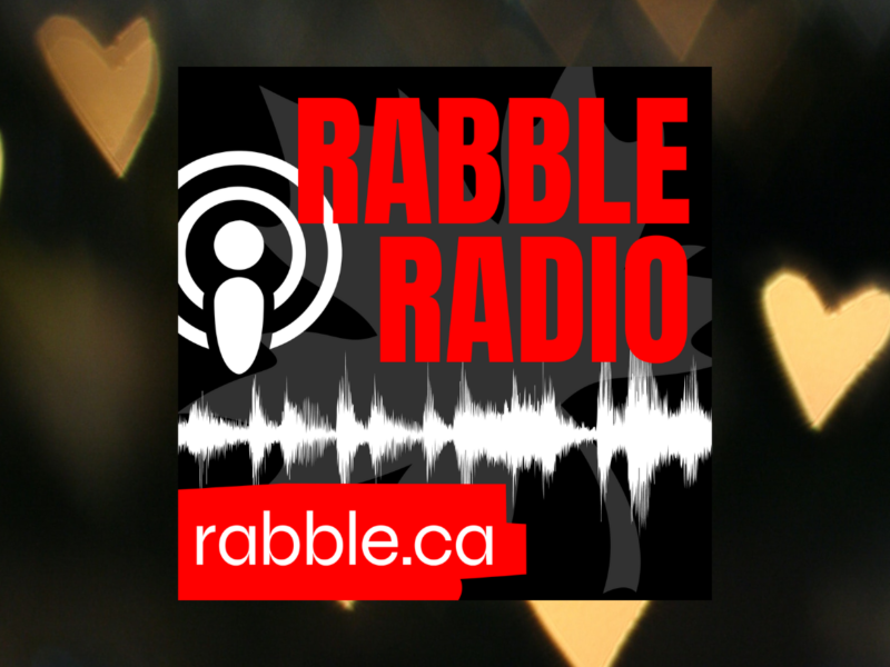 A photo of rabble radio logo on a heart-patterned background