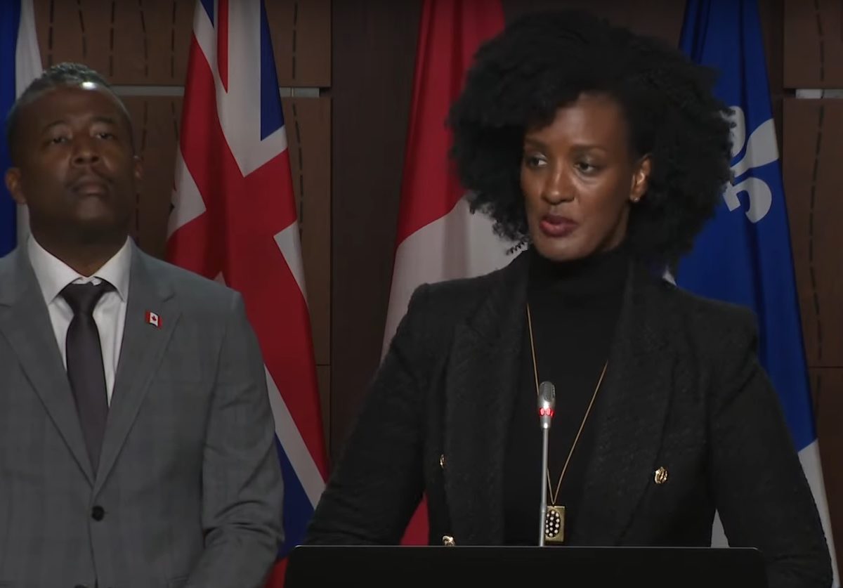 A screenshot of Amnesty International Canada Secretary General Ketty Nivyabandi as she addresses reporters during a press conference on October 2 along side BCAS executive director Nicholas Marcus Thompson.