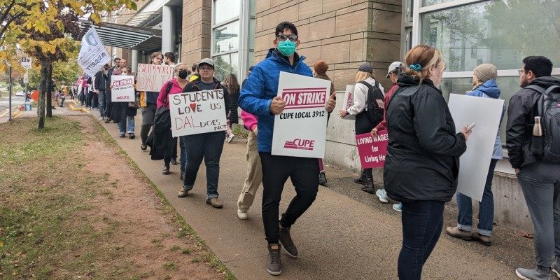 A photo of CUPE 3912 members picketing outside Dalhousie University