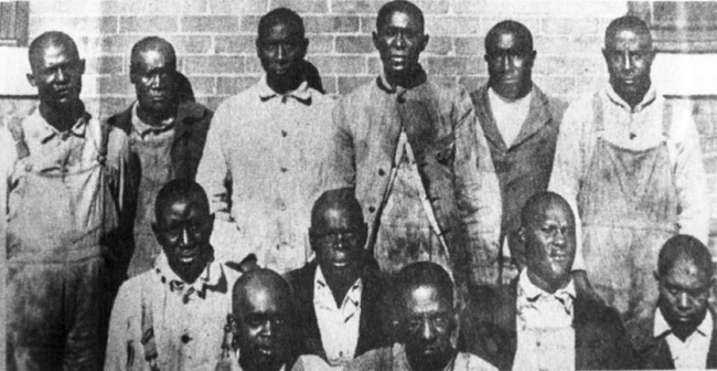 A photo of twelve Black men from the Elaine massacre.