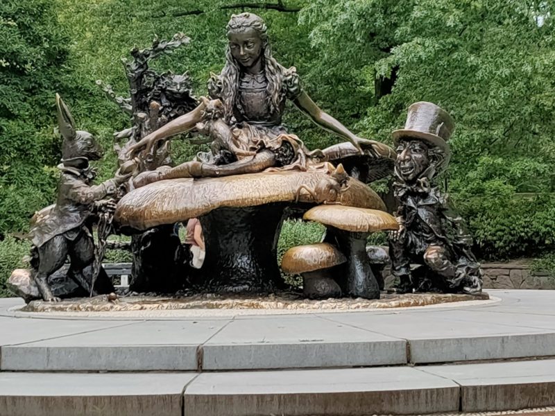 A photo of a sculpture of Alice in Wonderland in Central Park, New York, NY.