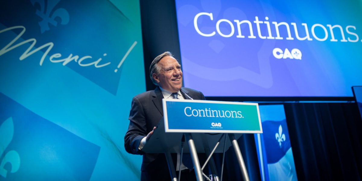 A photo of CAQ leader François Legault addressing his supporters after his election night victory.