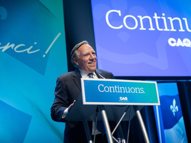 A photo of CAQ leader François Legault addressing his supporters after his election night victory.