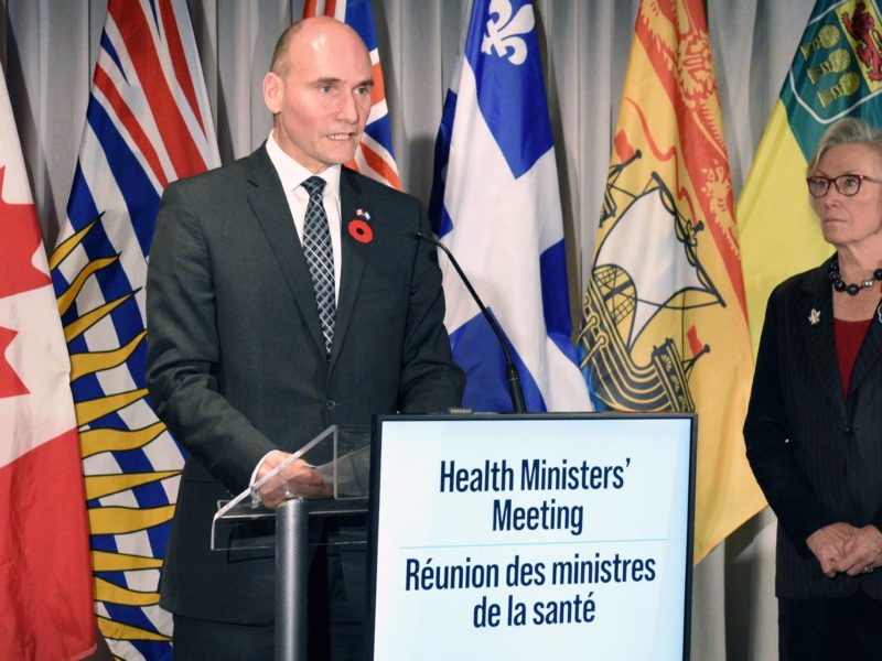 A photo of Canada's Health Minister Jean-Yves Duclos making a statement about healthcare funding alongside Minister for Addictions and Mental Health Carolyn Bennett.