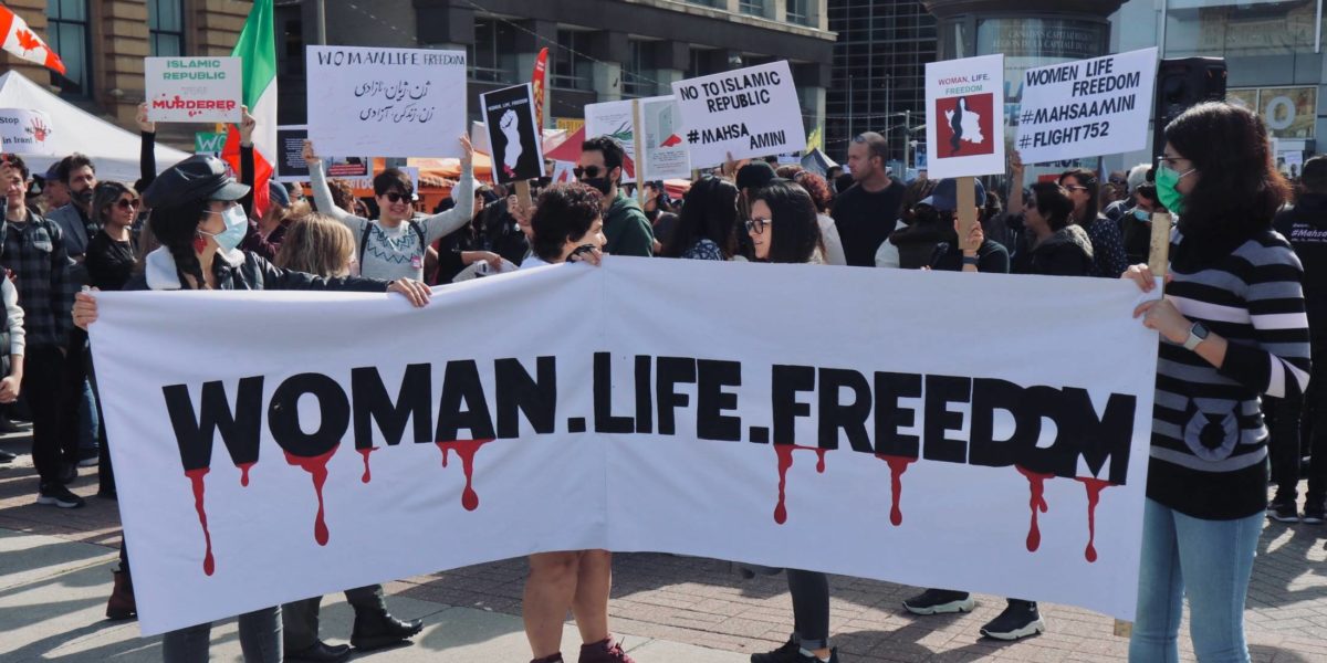 A photo of a protest in Canada in support of women in Iran.