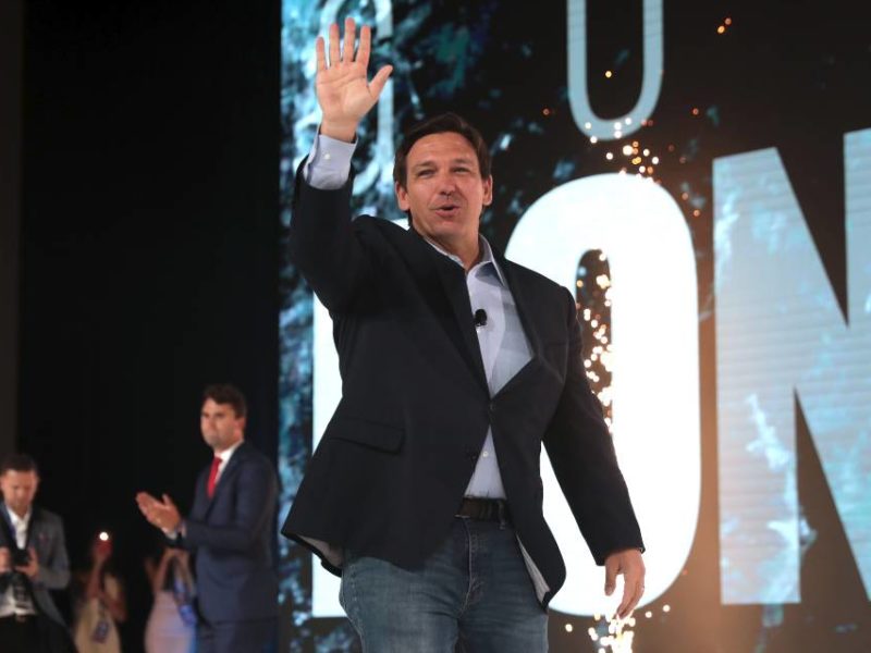 A photo of Florida governor Ron DeSantis speaking with attendees at the 2021 Student Action Summit.