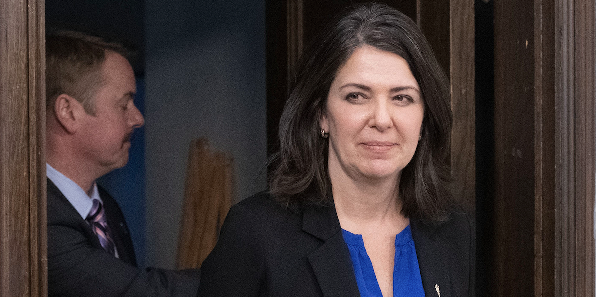 A photo of Alberta Premier Danielle Smith at a news conference, with Justice Minister Tyler Shandro in the background, on the “Alberta Sovereignty Within a United Canada Act.