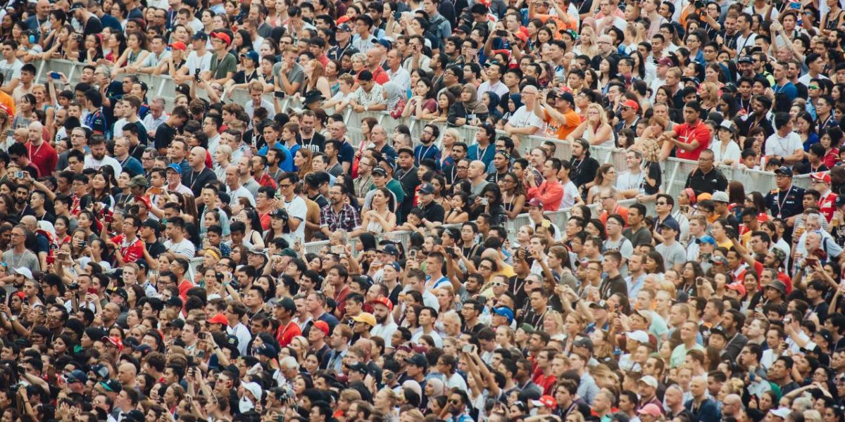 A photo of people at a crowded concert.