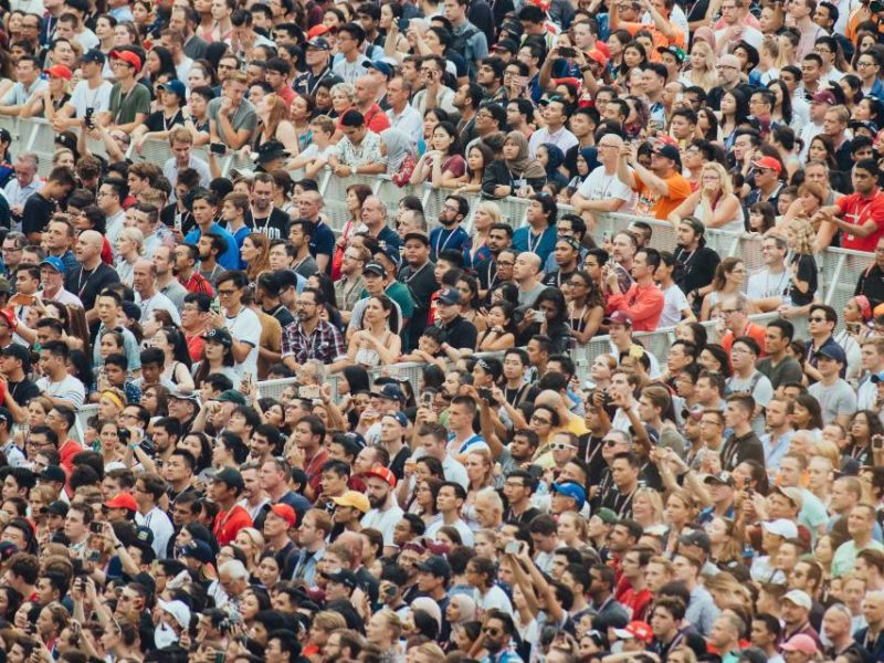 A photo of people at a crowded concert.