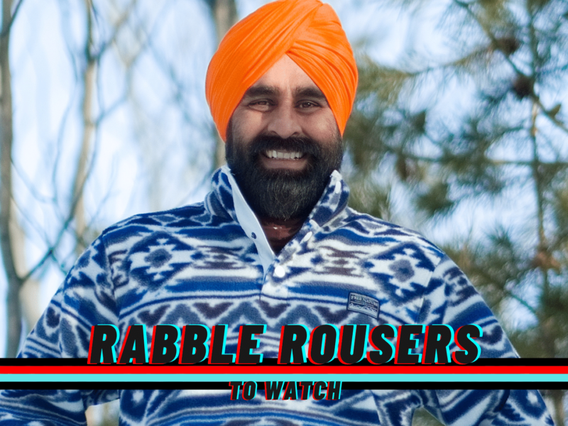 A photo of Gurdeep Pandher with the rabble rouser to watch logo across the bottom of the photo.