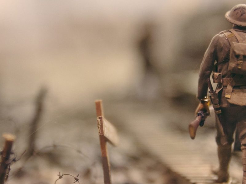 A photo of a solider walking through a ground mine area