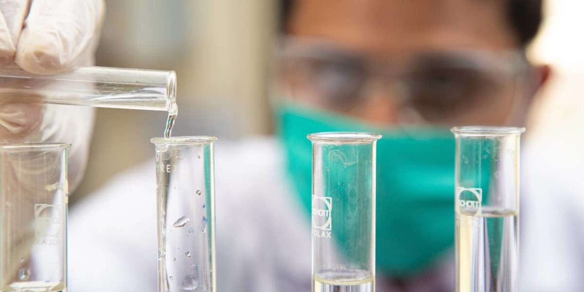 A photo of a technician working in a lab.