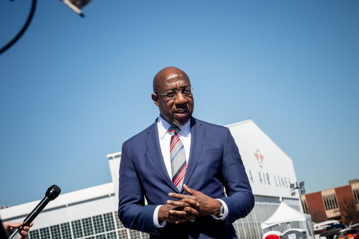 A photo of U.S. Senator Raphael Warnock, who won the Georgia Senate runoff despite Republican voter suppression tactics.