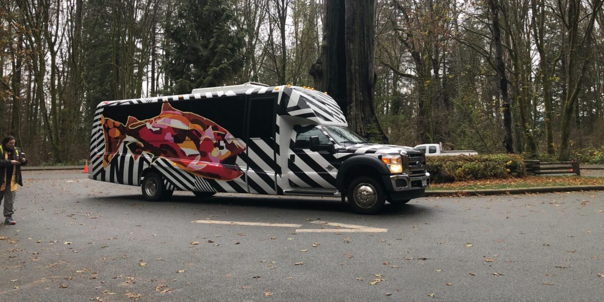 A photo of a NatureBus in Stanley Park.