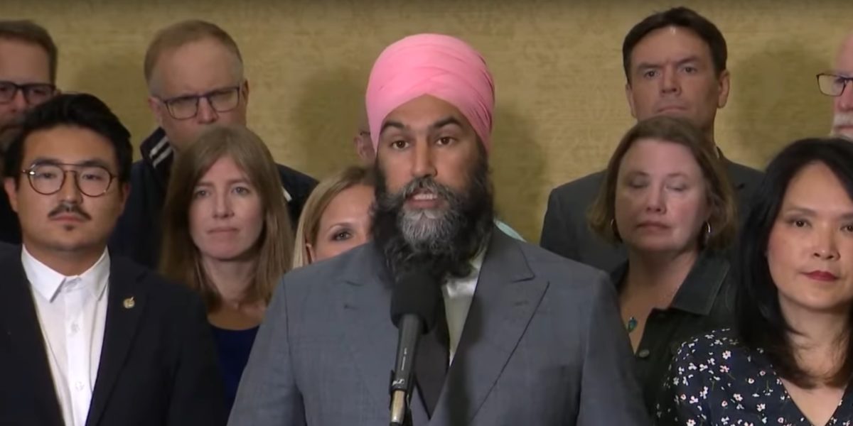 NDP leader Jagmeet Singh with his caucus in September of 2022.