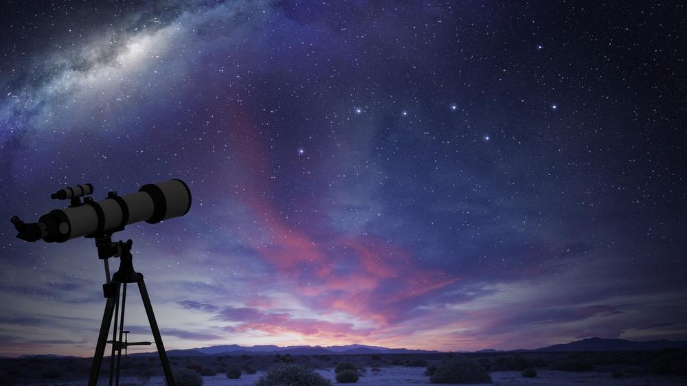 An image of a telescope pointed towards the night sky.