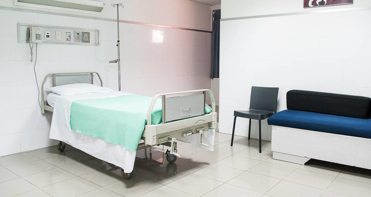 A vacant medical bed.