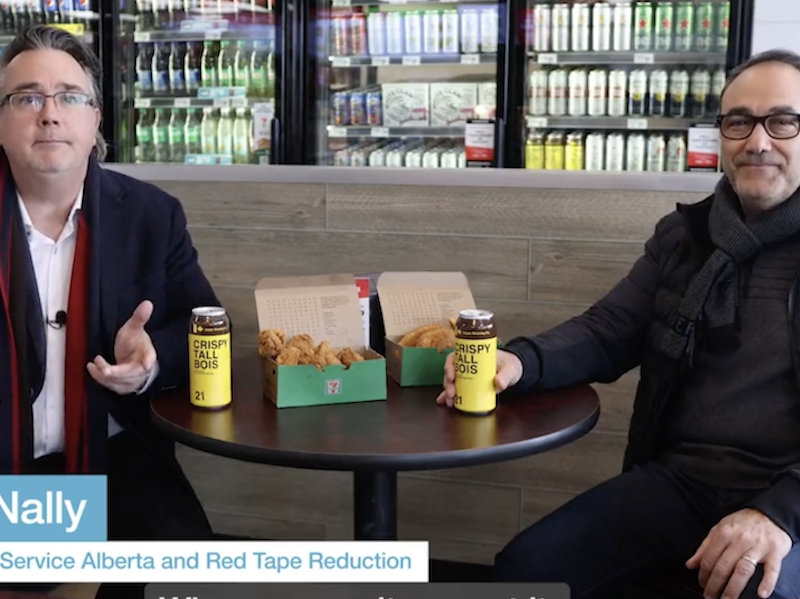 Dale Nally and his otherwise unidentified pal Larry having a daytime can of Crispy Tall Bois pilsner in an Edmonton 7-Eleven.