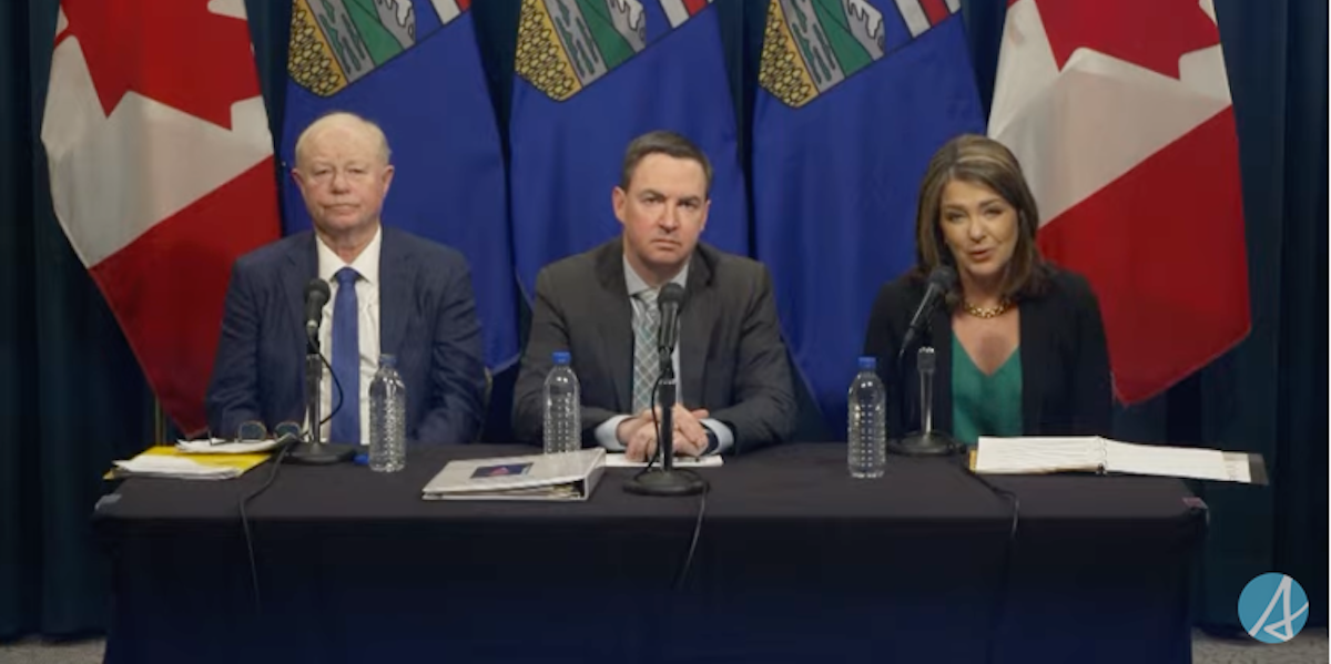 Dr. John Cowell, Health Minister Jason Copping, and Premier Danielle Smith at a news conference.