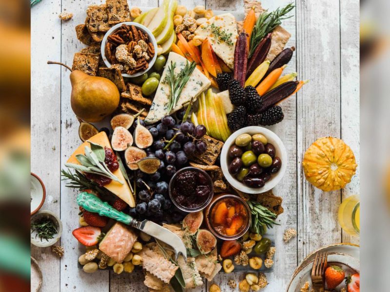 A farm table full of delicious foods.