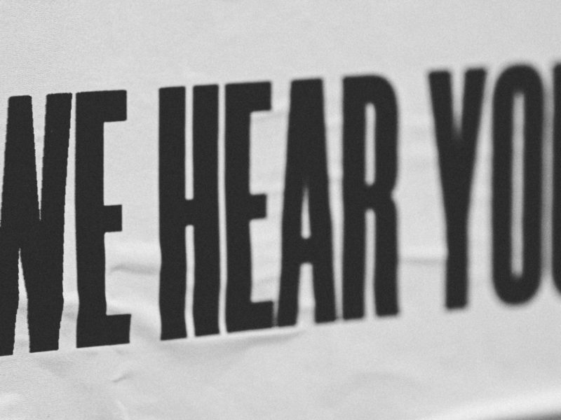 An image of a banner that has the words, "We hear you."
