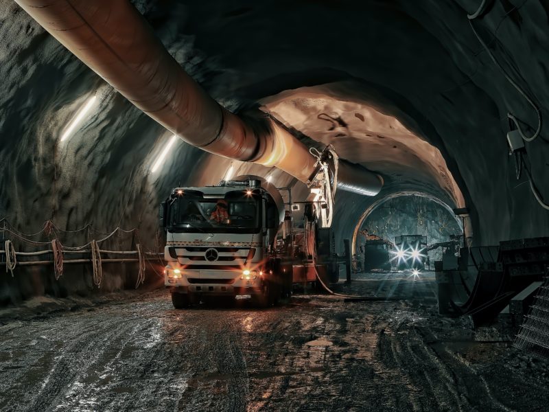 An image of a truck driving through a tunnel.