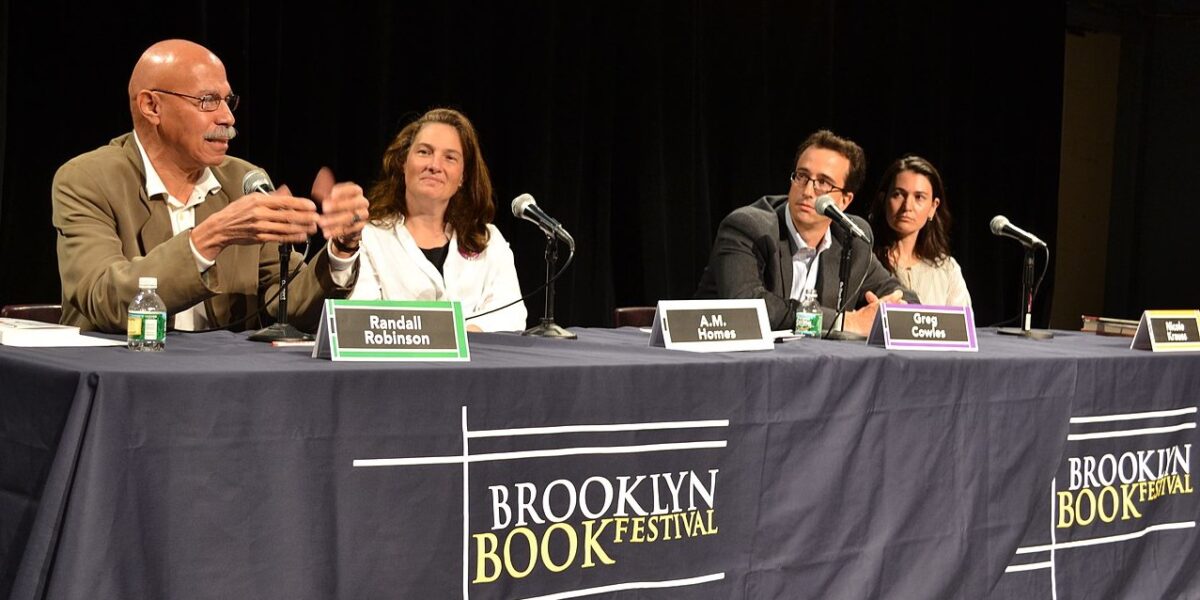An image of Randall Robinson with writers A.M. Homes, Greg Cowles, and Nicole Krauss at the Brooklyn Book Festival.