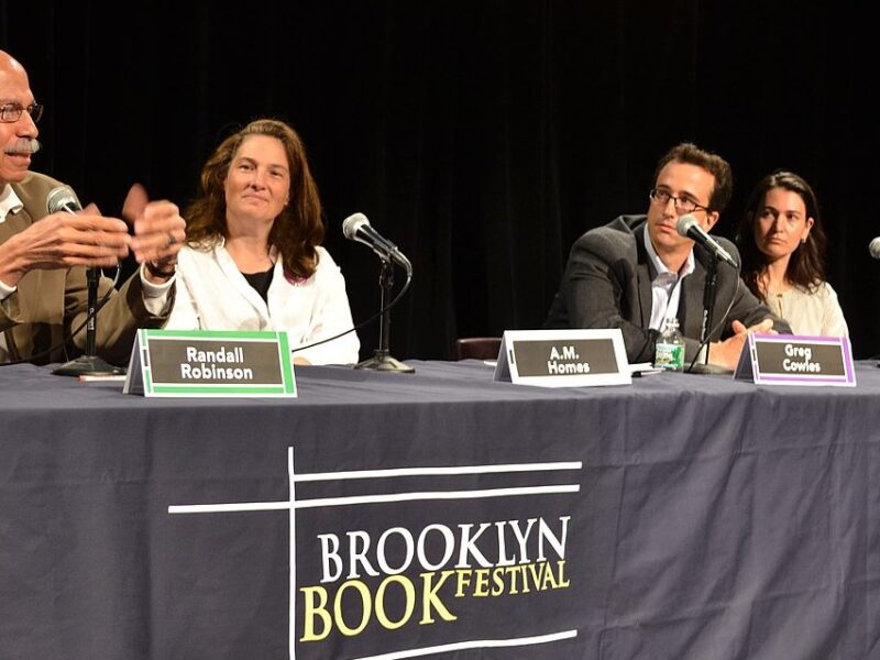 An image of Randall Robinson with writers A.M. Homes, Greg Cowles, and Nicole Krauss at the Brooklyn Book Festival.