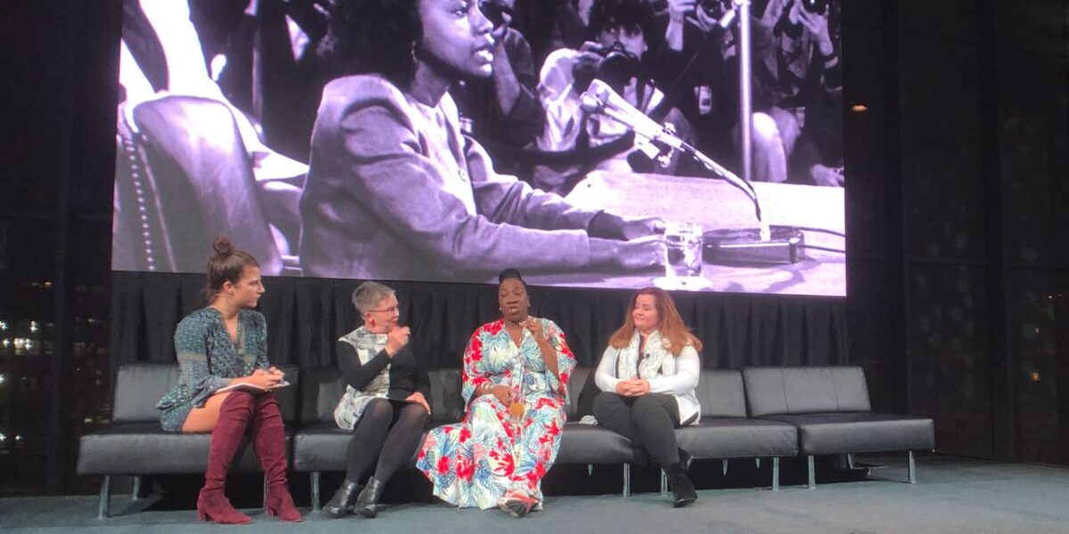 Tarana Burke, seated centre-right, speaking at the 2018 Disobedience Awards in Cambridge, MA.