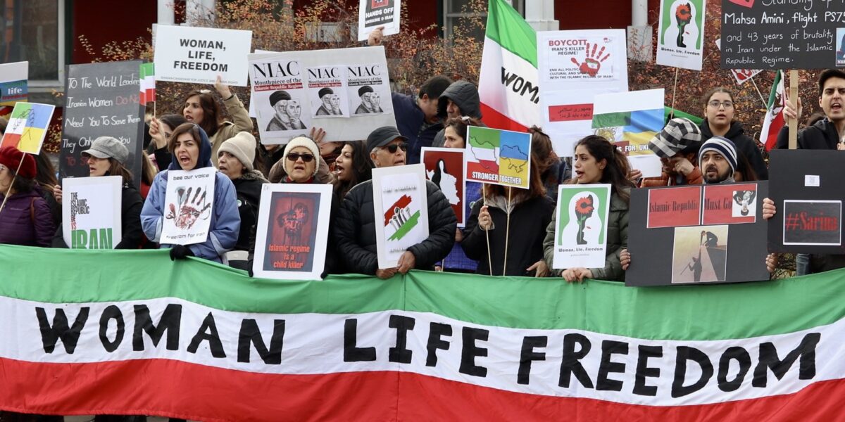 Photo of a protest with the slogan "Women, Life, Freedom" following the death of Mahsa Amini in police custody.
