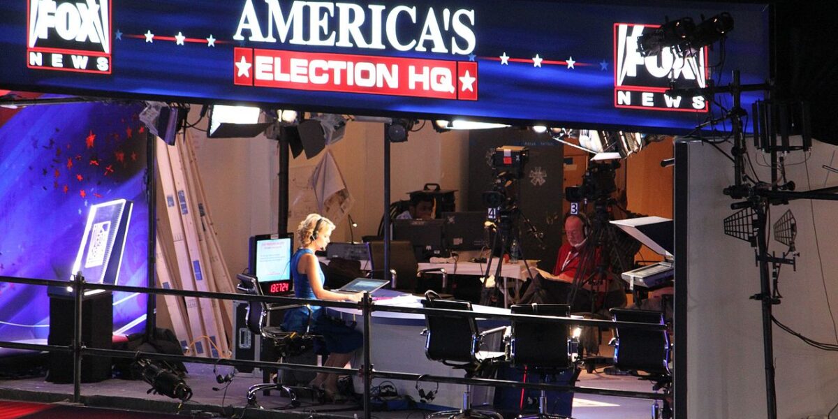 A photo of former Fox News anchor Megyn Kelly in front of television cameras covering the 2012 Democratic National Convention.