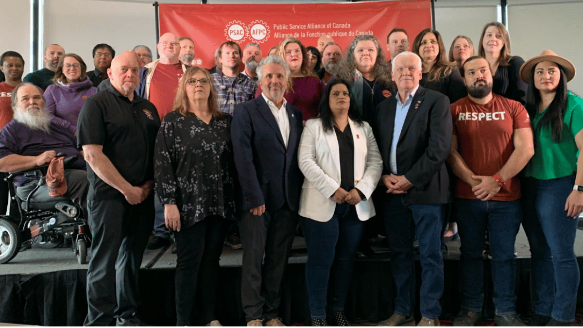 PSAC members at a press conference on Wednesday, April 12, 2023.