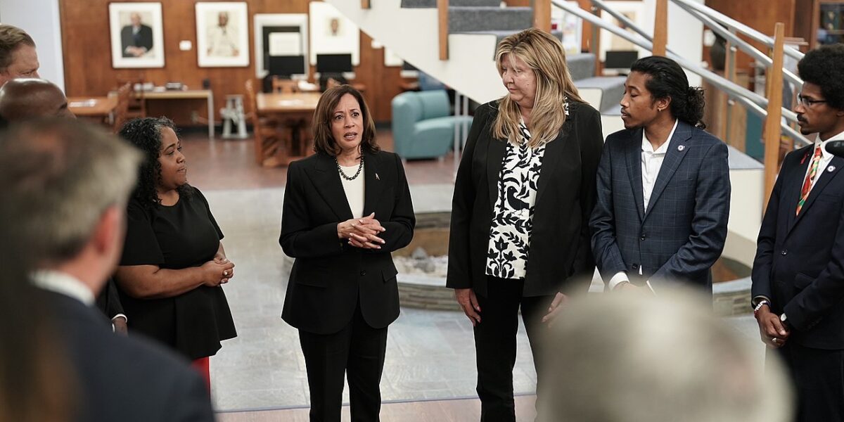 An image showing The Tennessee Three (right) pictured with Vice President Kamala Harris (centre).