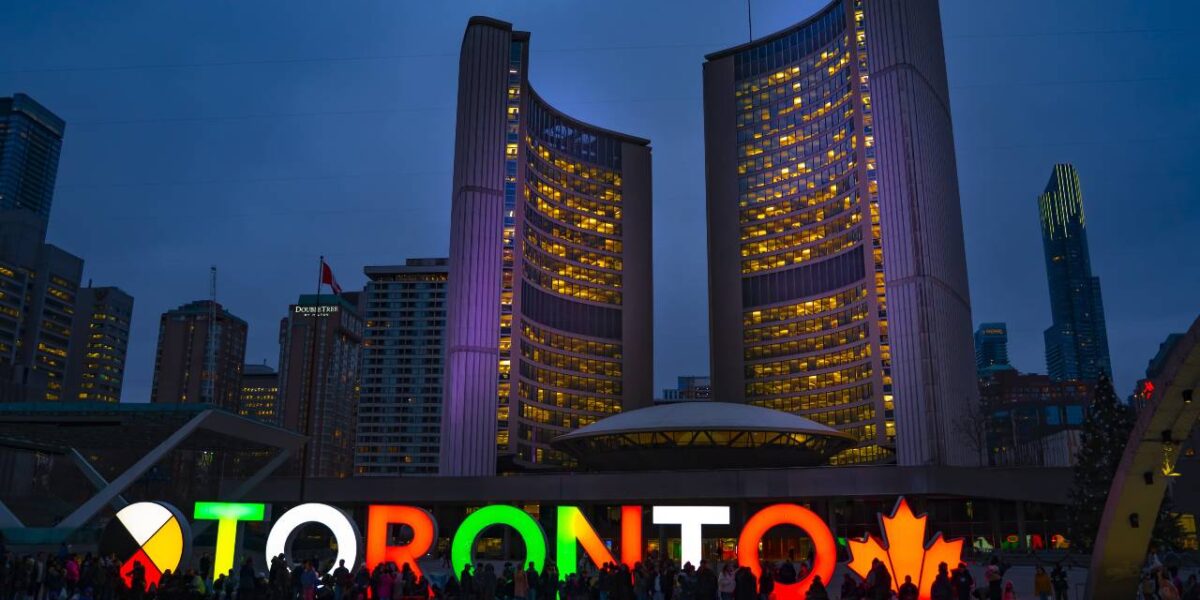 Toronto City Hall at dusk.